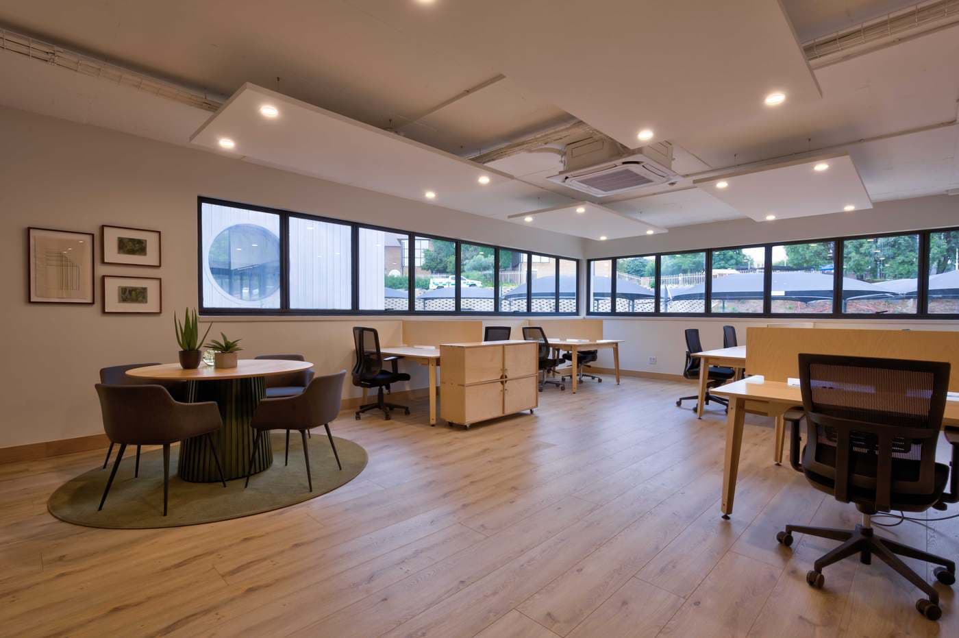 Open-plan serviced office workspace with desks at OnPoint in Midpoint